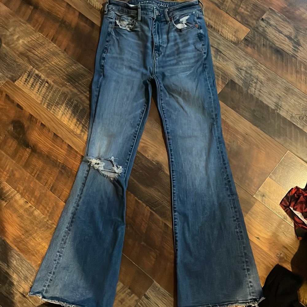 jean blue, knee ripped, flare jeans, size 4, American eagle
